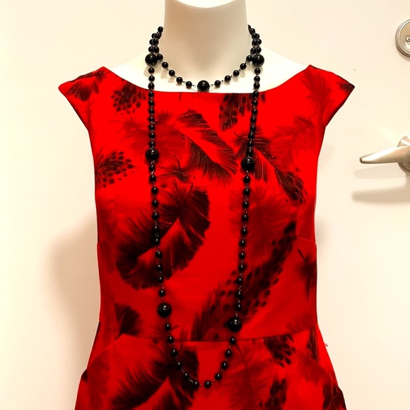 JACOB red dress with black feathers and pockets - Picture 2 of 11